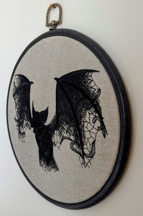 Lace Bat onto natural linen, Hoop Art, machine embroidered 8" hoop