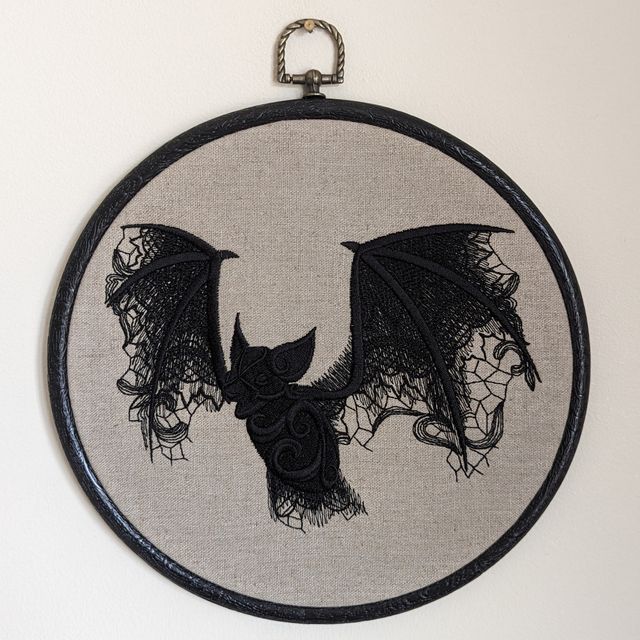 Lace Bat onto natural linen, Hoop Art, machine embroidered 8" hoop