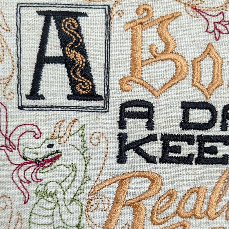 A book a day keeps reality away, 8" machine embroidered hoop