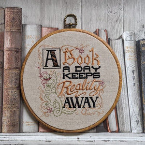 A book a day keeps reality away, 8" machine embroidered hoop