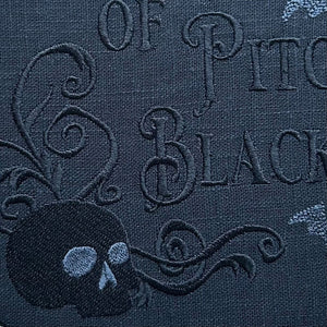 A Little Ray of Pitch Black,  Embroidered Hoop - moody, skull-and-bats embroidery for Halloween vibes all year long.