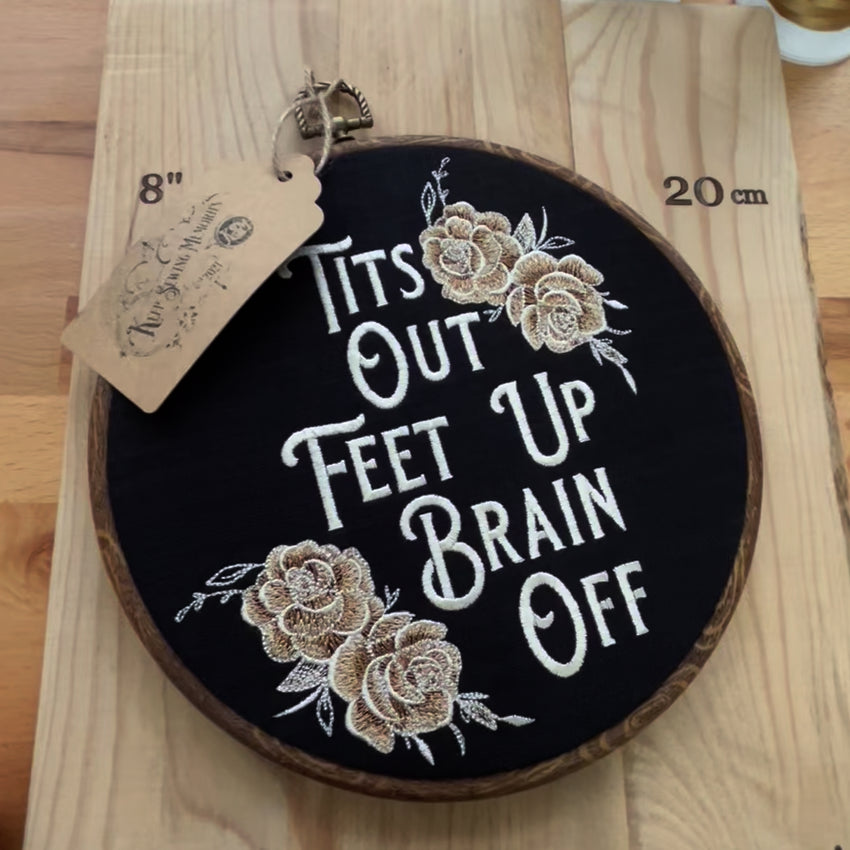 This stunning wall hanging features gold roses beautifully embroidered onto rich black linen, creating a bold and sassy statement piece. With a wood frame and a perfect blend of vintage charm and modern flair
