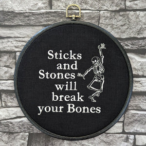 Sticks and stones will break your bones. Machine embroidered 8" hoop