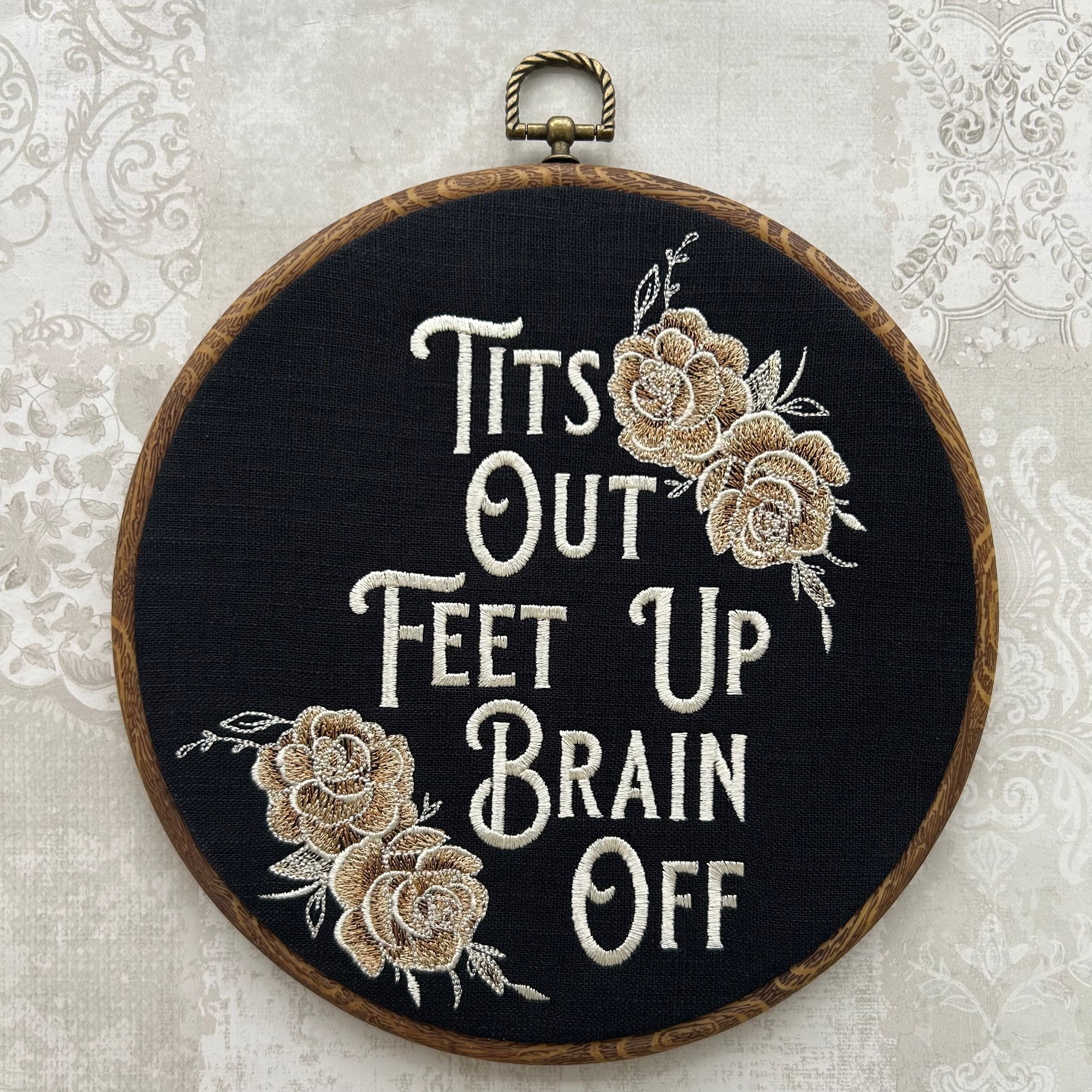 This stunning wall hanging features gold roses beautifully embroidered onto rich black linen, creating a bold and sassy statement piece. With a wood frame and a perfect blend of vintage charm and modern flair