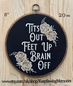 This stunning wall hanging features gold roses beautifully embroidered onto rich black linen, creating a bold and sassy statement piece. With a wood frame and a perfect blend of vintage charm and modern flair