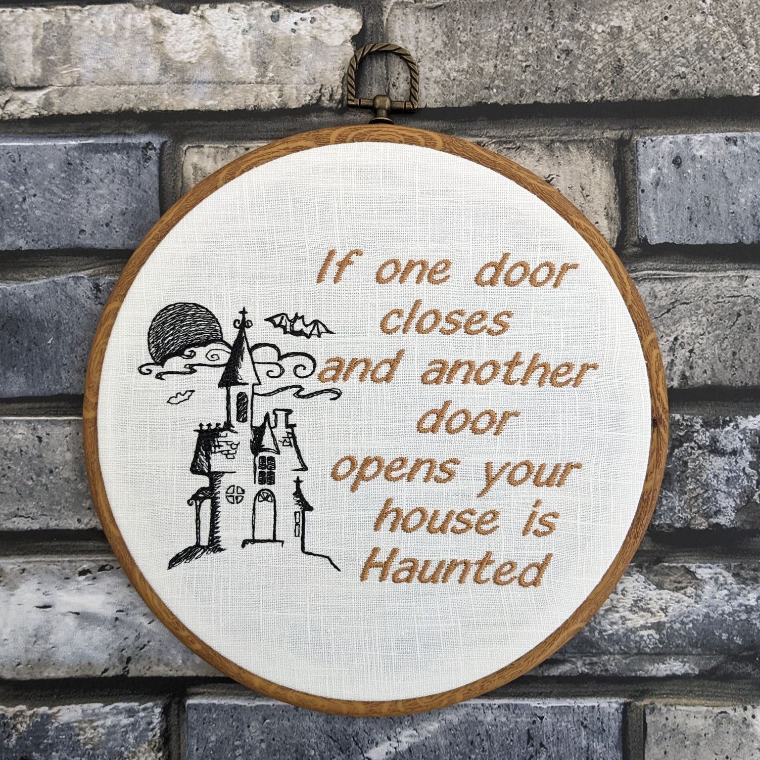 If one door closes and another door opens your house is Haunted. Machine embroidery 8" hoop art