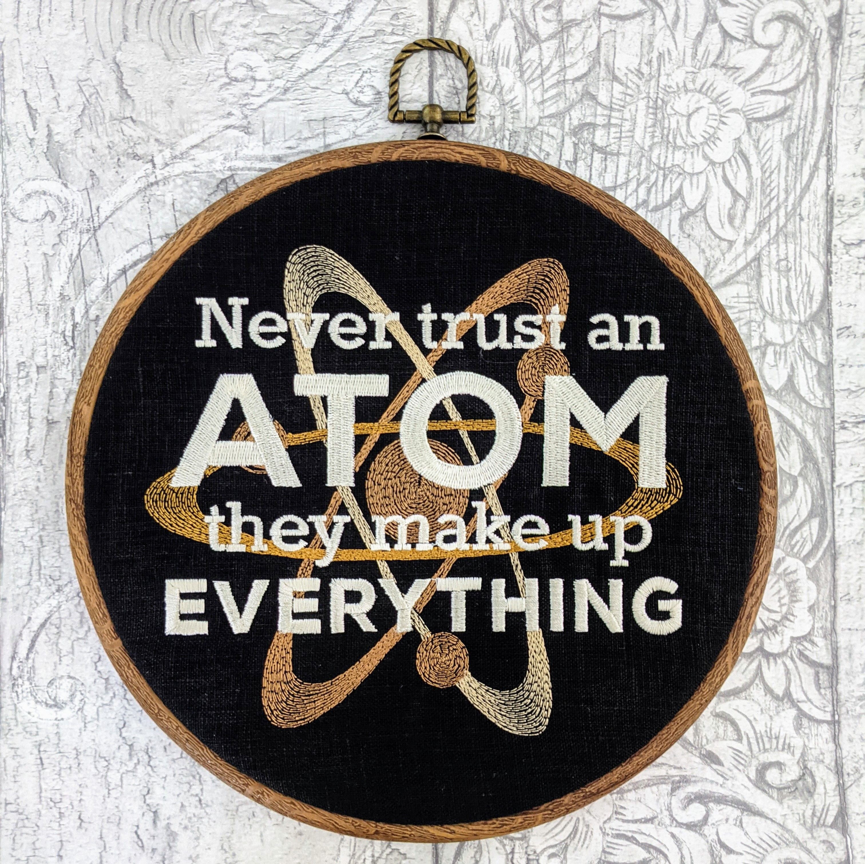 Never trust an ATOM they make up everything.  Machine embroidery 8" hoop