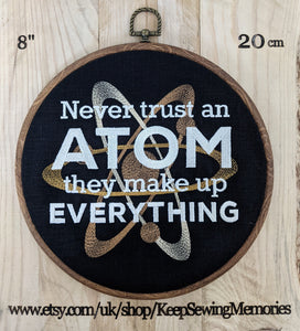 Never trust an ATOM they make up everything.  Machine embroidery 8" hoop