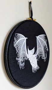 Lace Bat tonal whites onto black linen, Hoop Art, machine embroidered 8" hoop