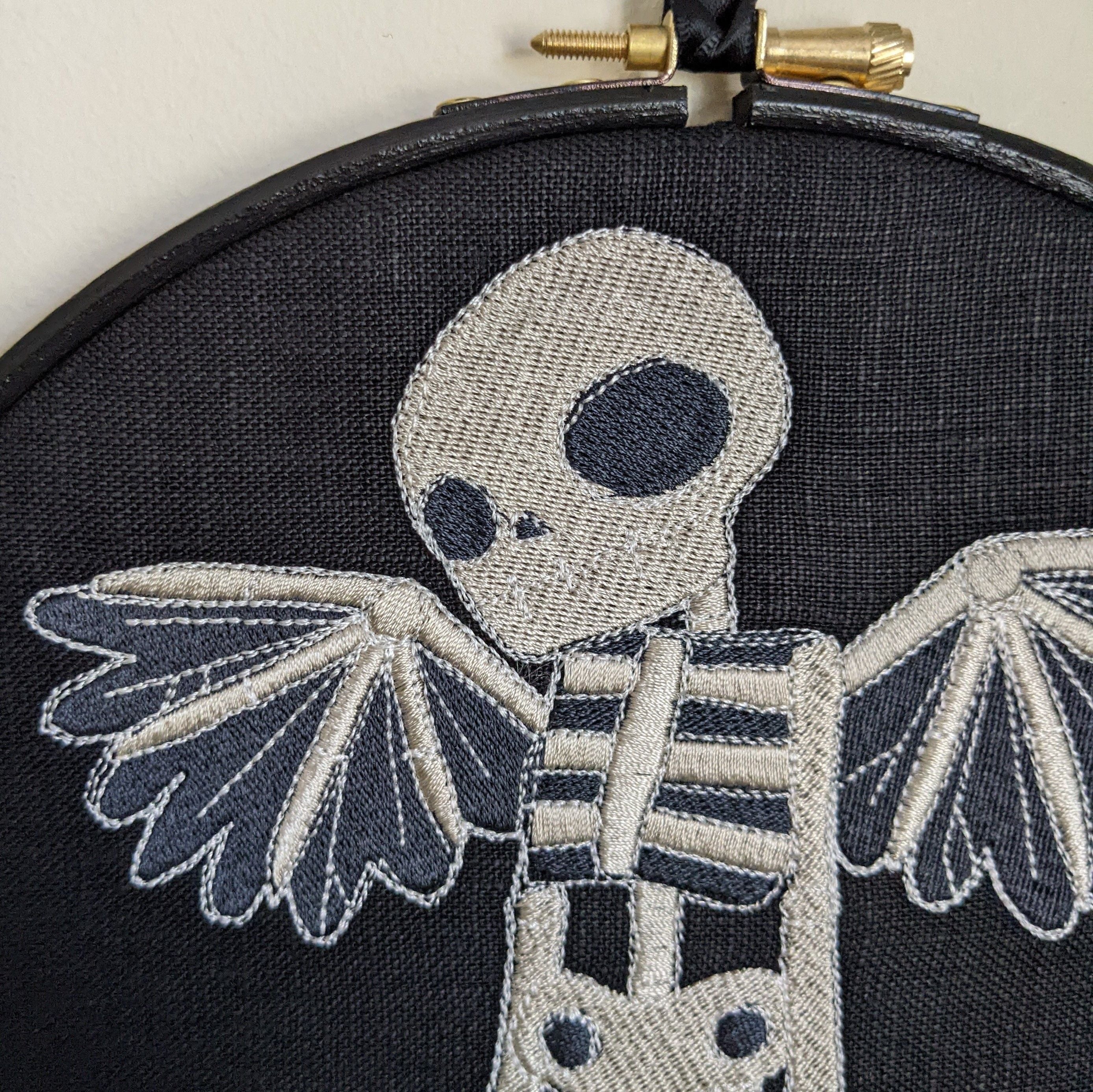 Winged Skeleton, machine embroidered 8" hoop art