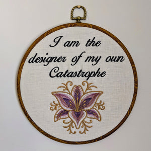 I am the designer of my own Catastrophe. Machine embroidery 8" hoop art