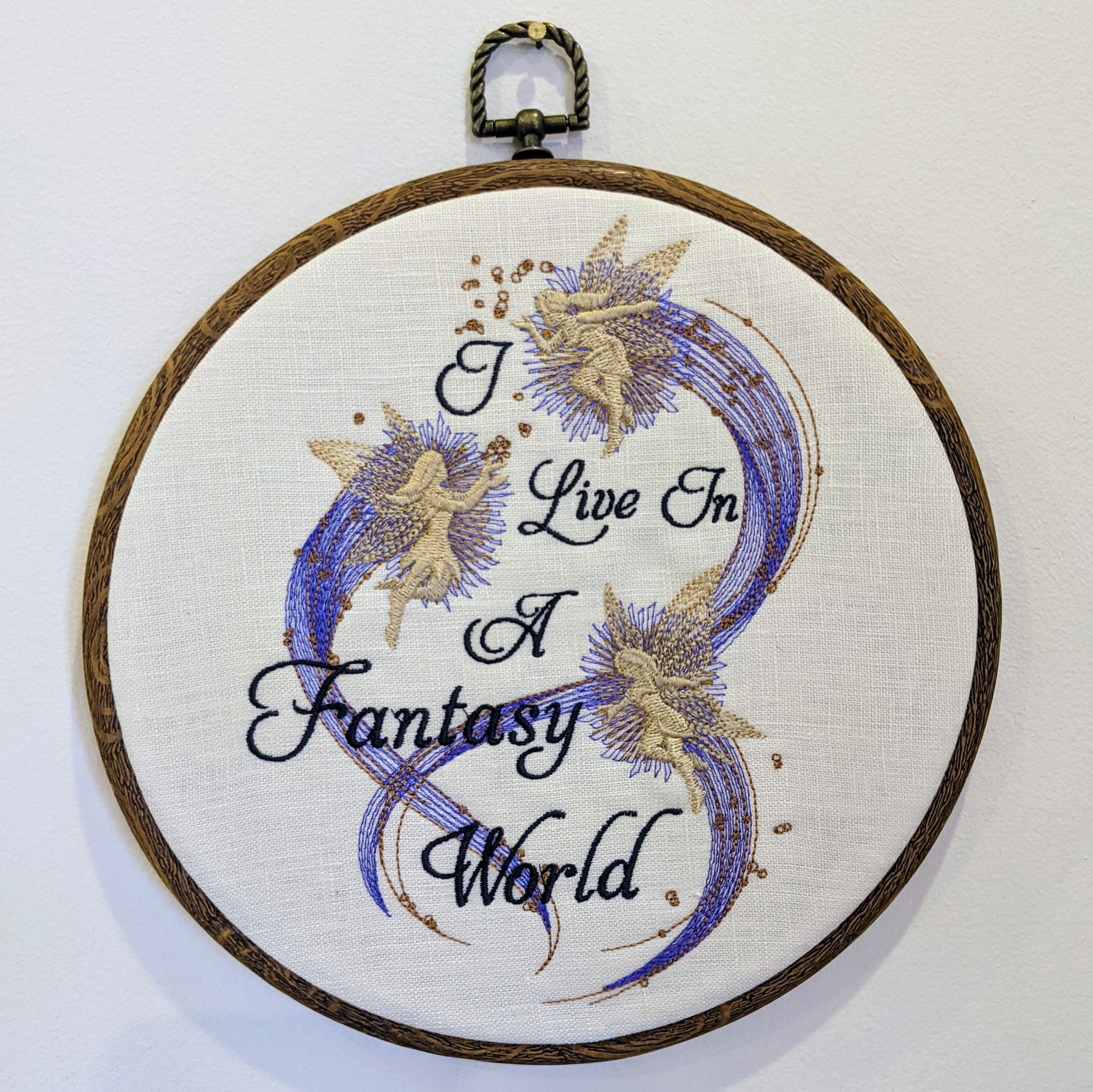 I live in a fantasy world. Machine embroidery 8" hoop art