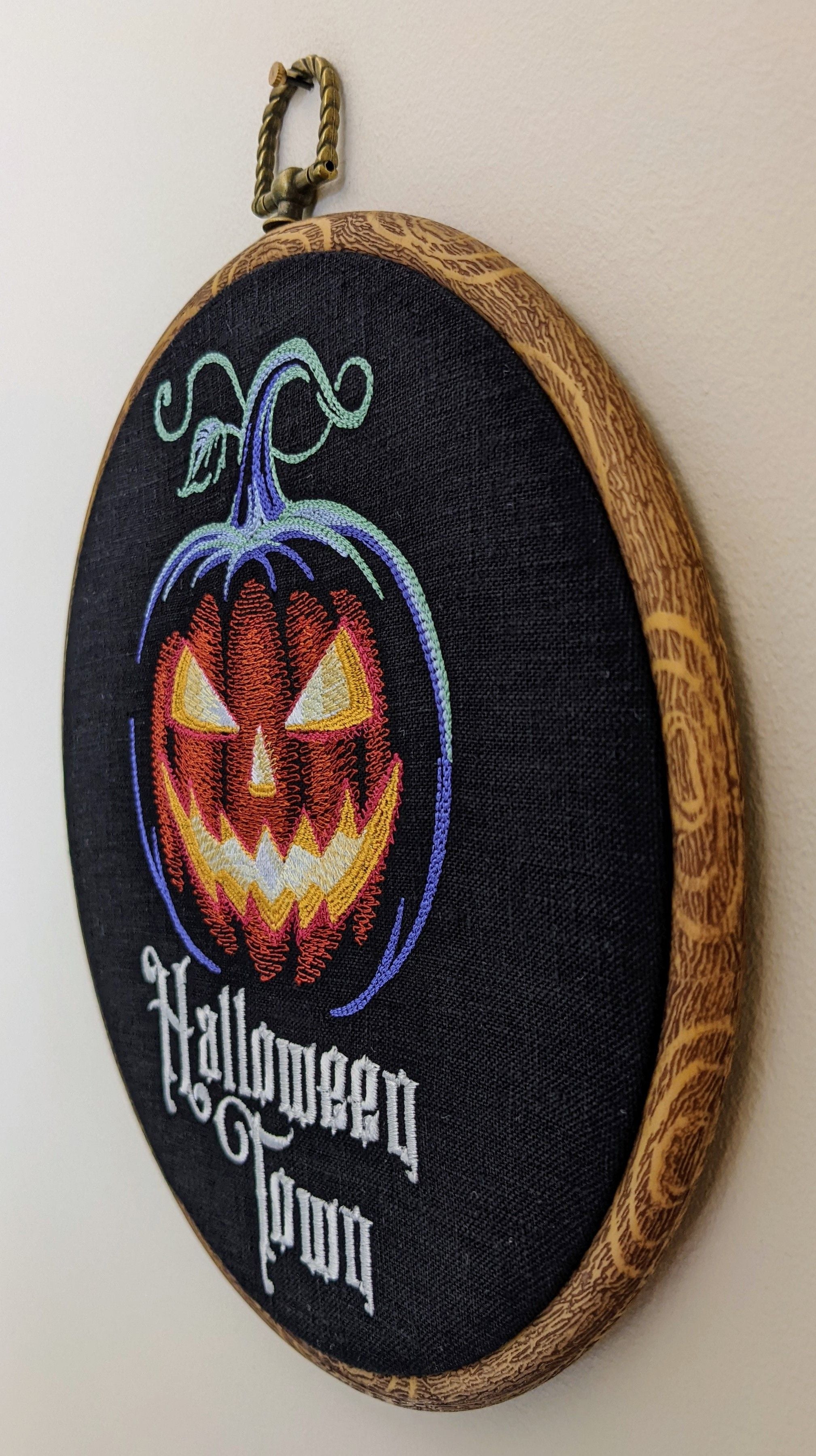 Halloween Town, spooky pumpkin. Machine embroidered 8" hoop