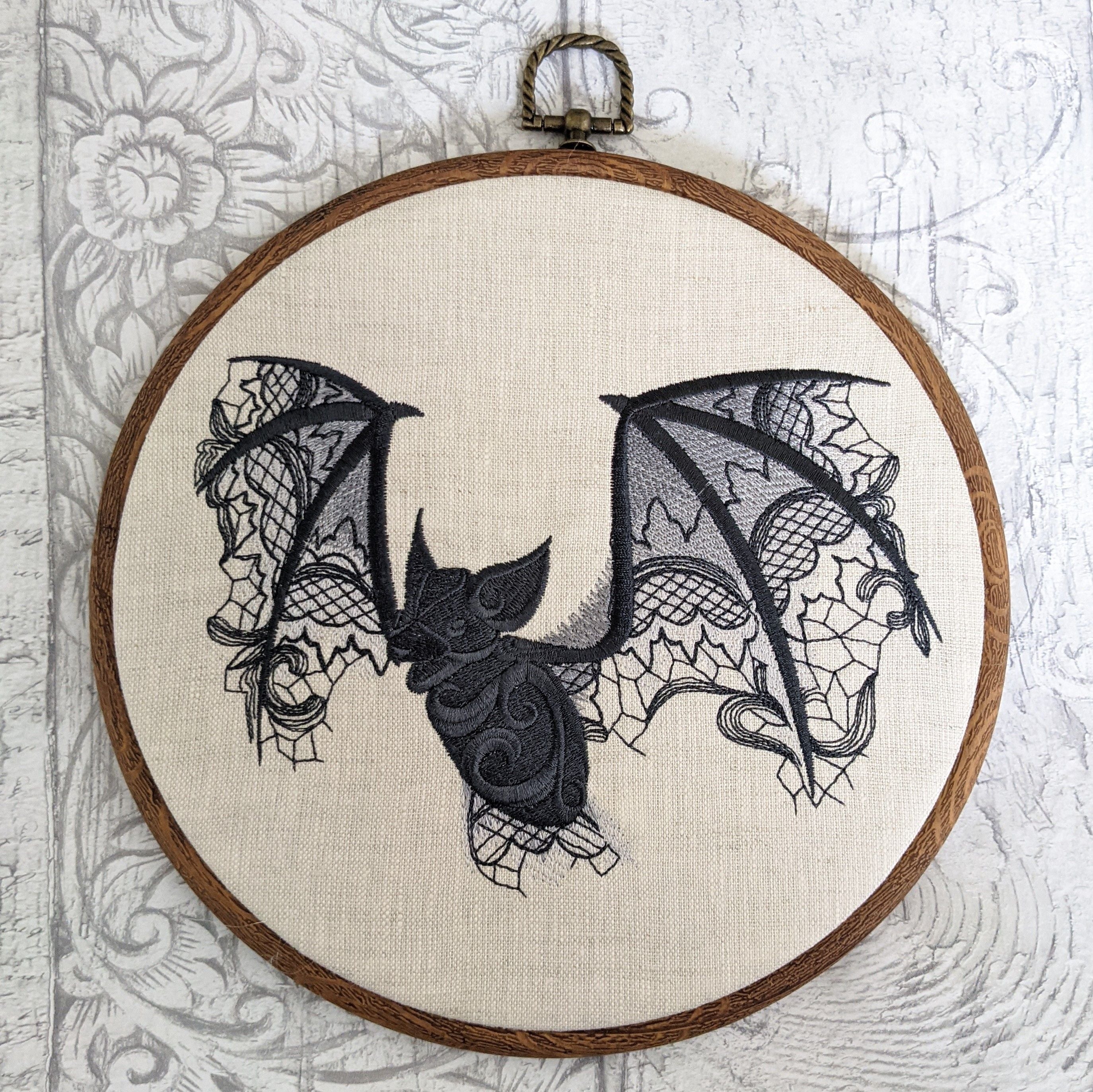 Lace Bat tonal greys onto natural linen, Hoop Art, machine embroidered 8" hoop