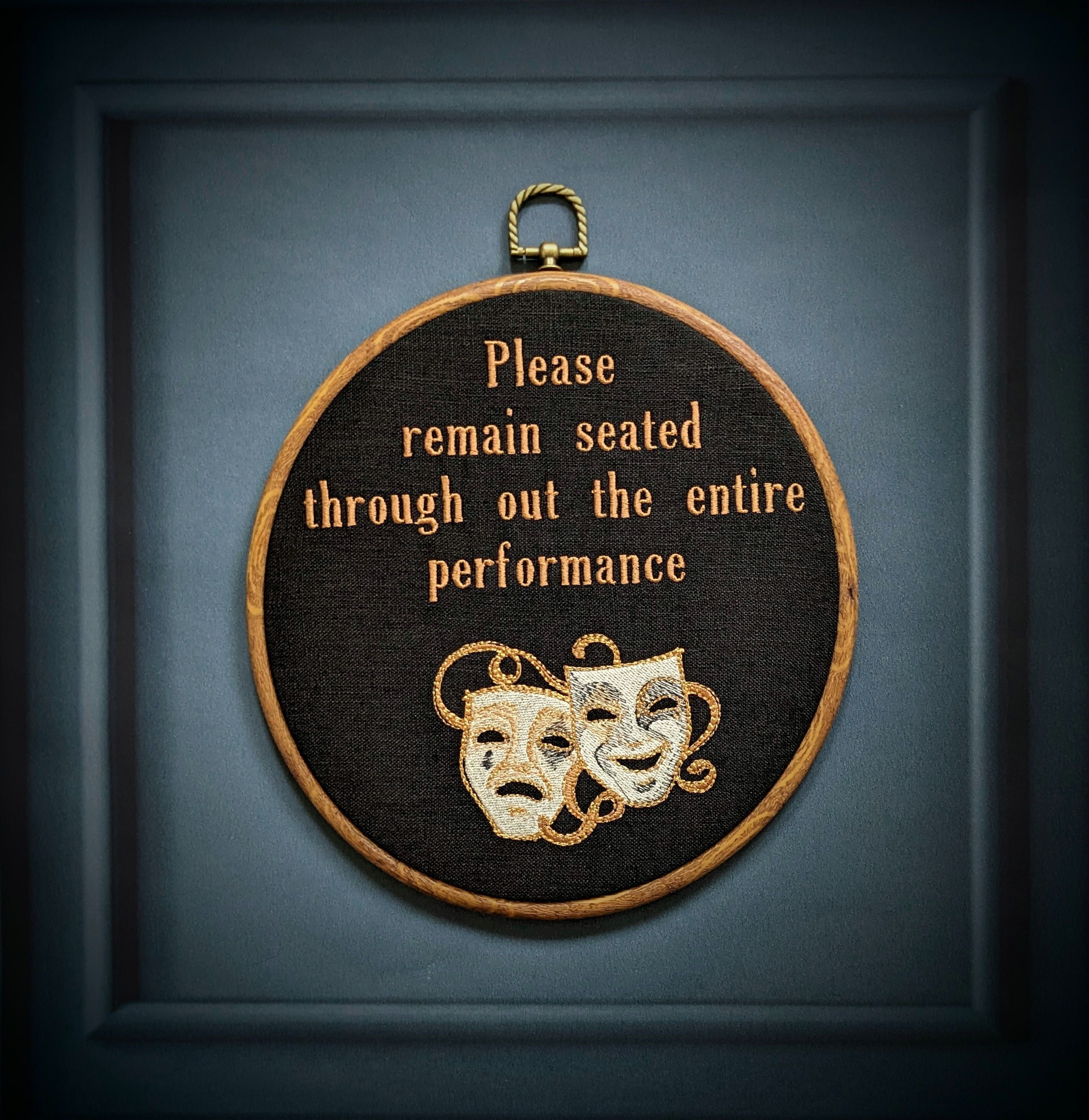 Please remain seated through out the entire performance hoop art. Machine embroidery 8" hoop. Gothic décor, bathroom décor.