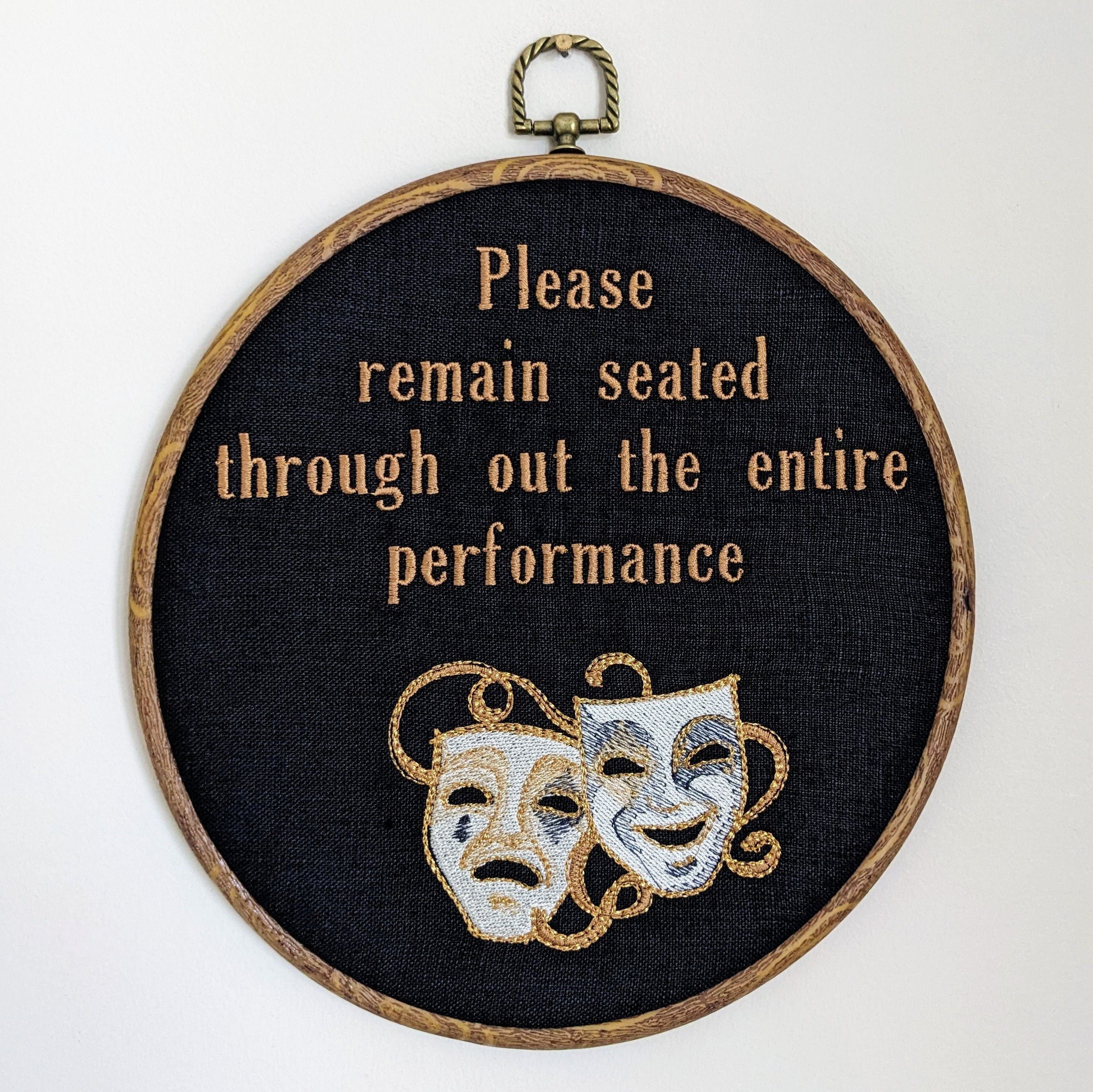 Please remain seated through out the entire performance hoop art. Machine embroidery 8" hoop. Gothic décor, bathroom décor.