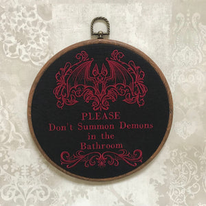 Please don't summon demons in the bathroom hoop art. Machine embroidery 8" hoop. Gothic décor, bathroom décor.