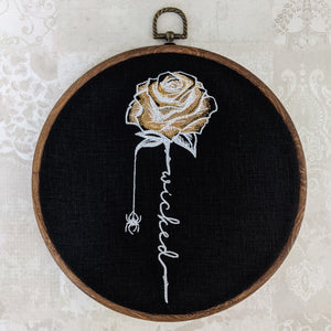 Gold gothic rose with spider, Wicked. Machine embroidered 8" hoop