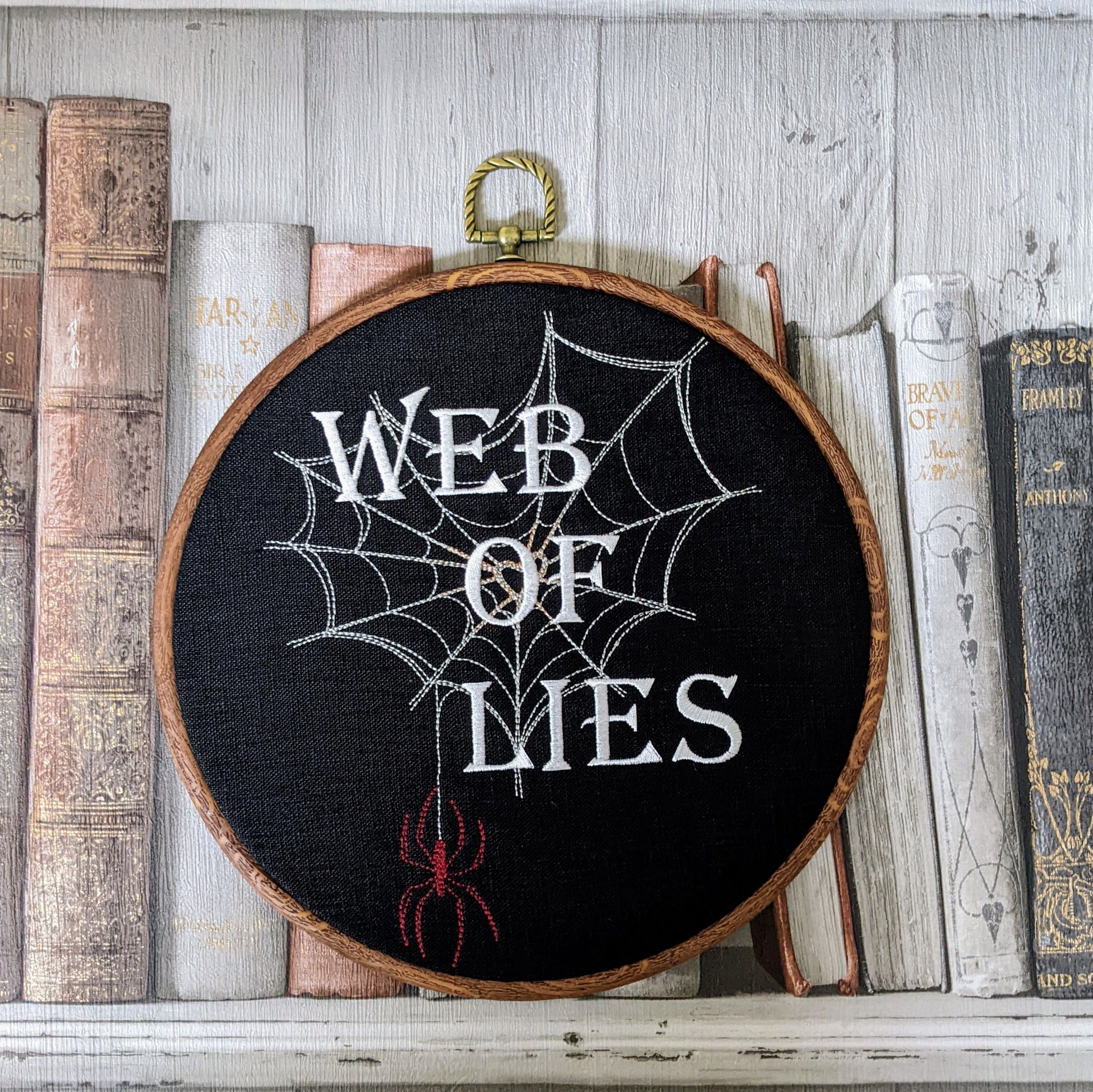 Web of lies. Machine embroidered 8" hoop art