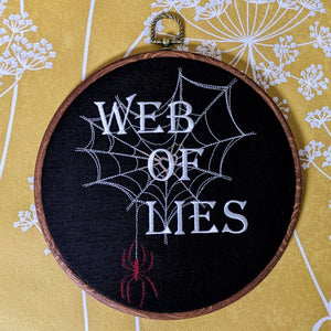 Web of lies. Machine embroidered 8" hoop art